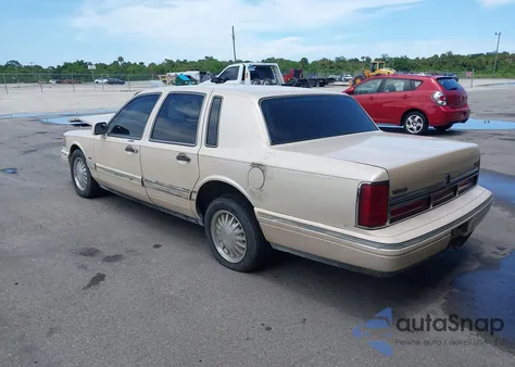 1996 Lincoln Town Car Cartier z USA, uszkodzony, nr VIN 1LNLM83W7TY634343